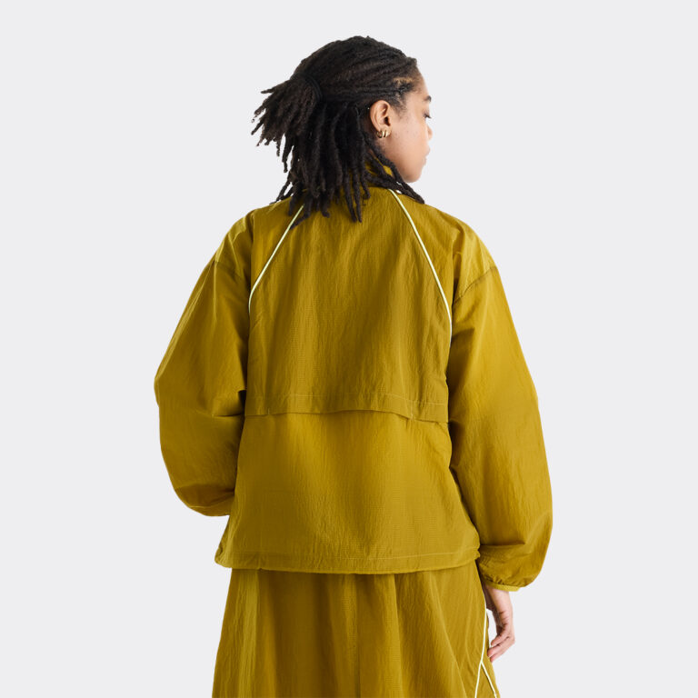 new-balance-sport-legacy-jacket-wj6113ks-bil-basil-oil-1